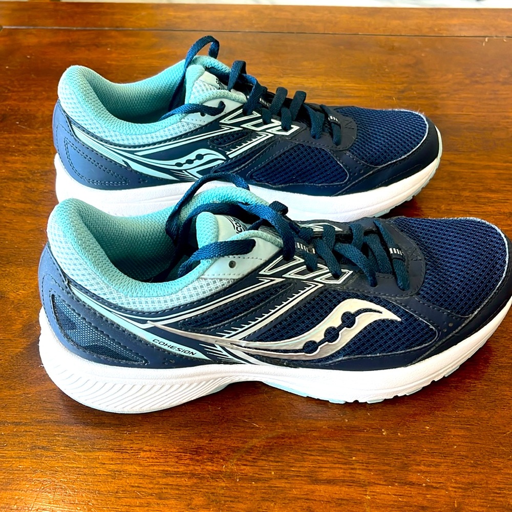 Very gently worn Women’s Saucony Cohesion athletic shoes, size 8.5